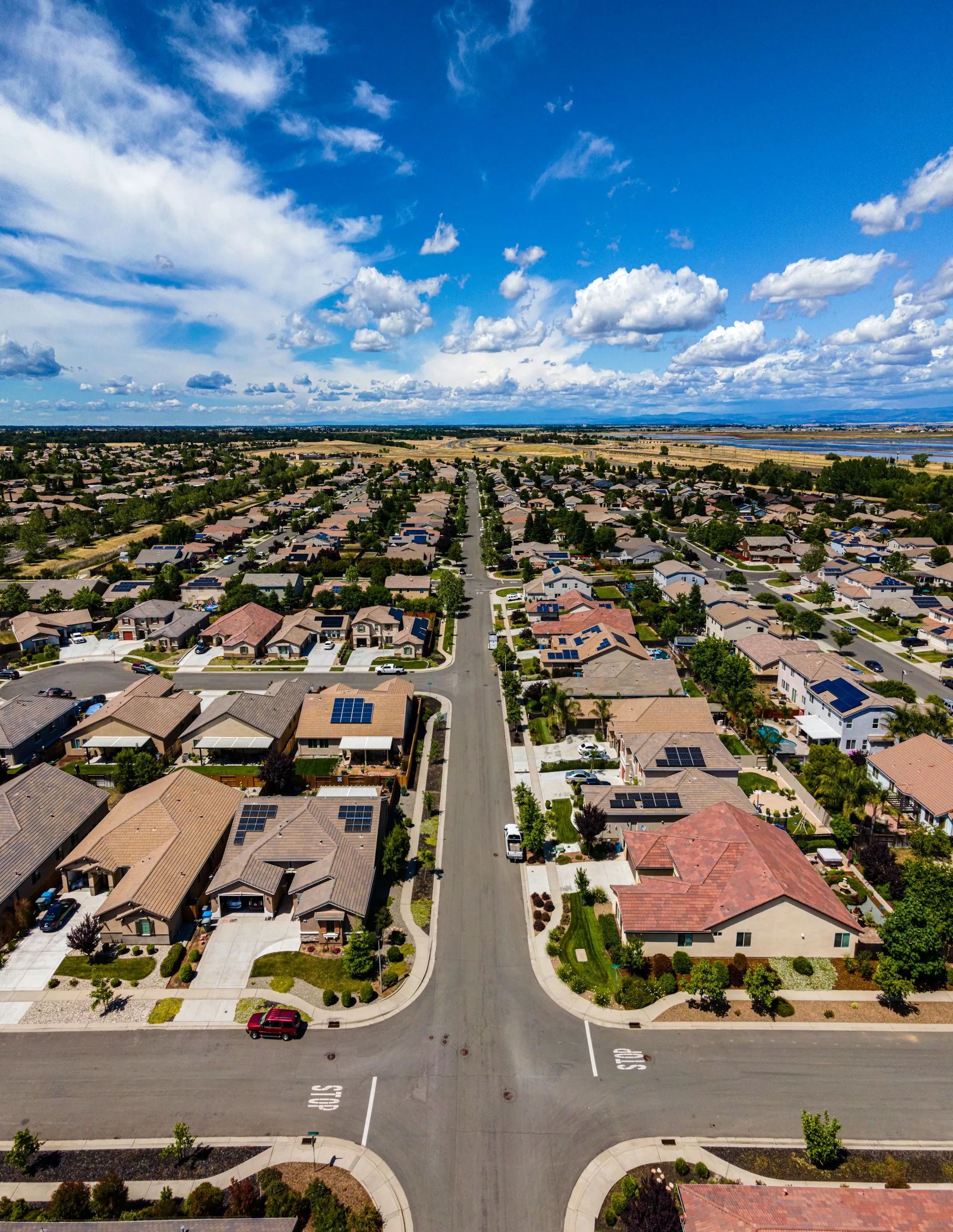 Aerial view of a suburban neighborhood and its streets